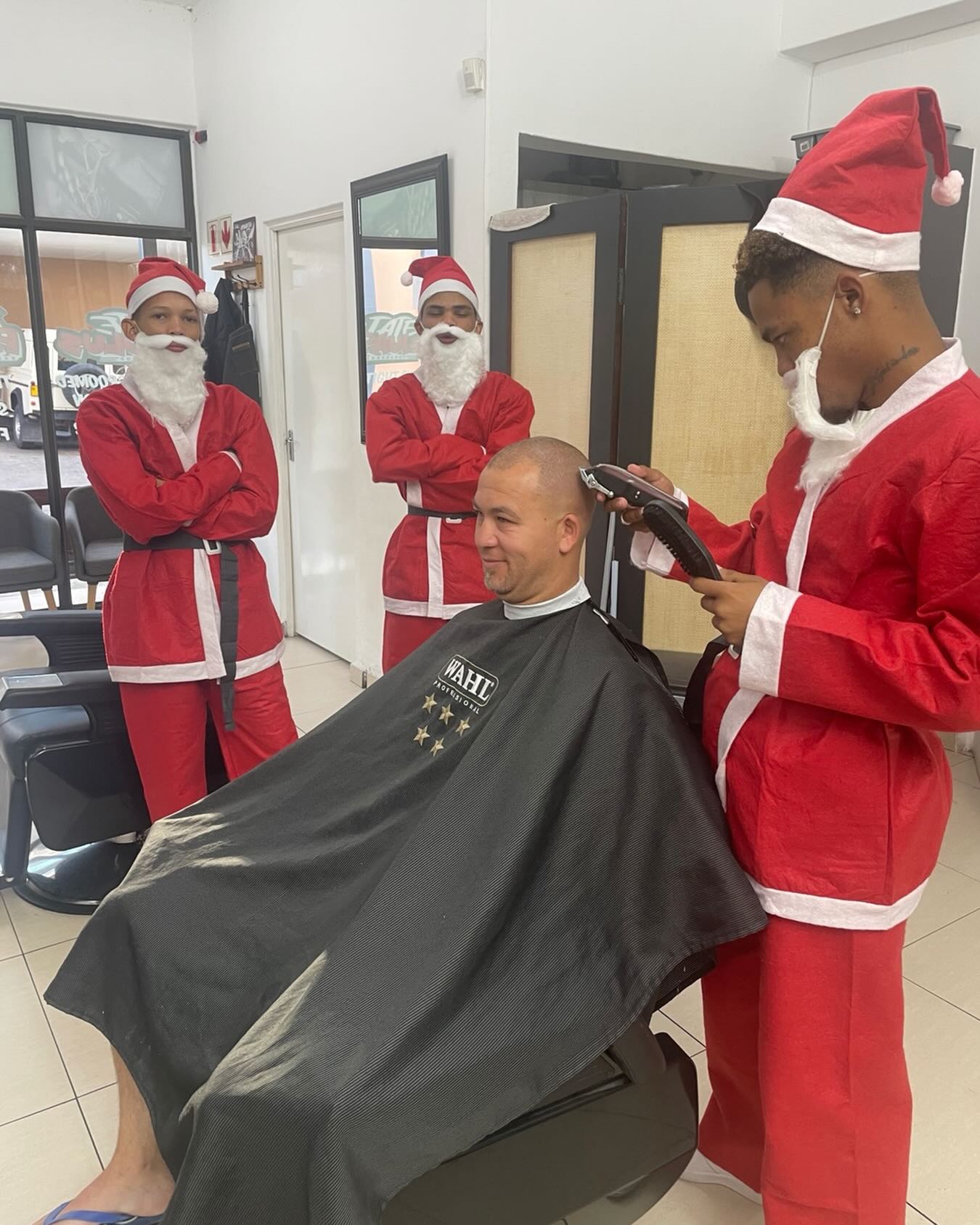 Paul's Barbershop team in festive mode